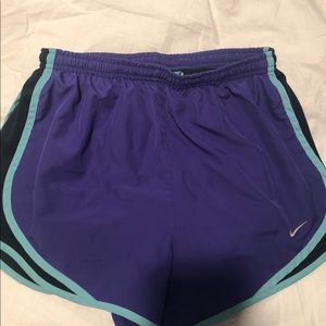 Purple and blue nike athletic shorts